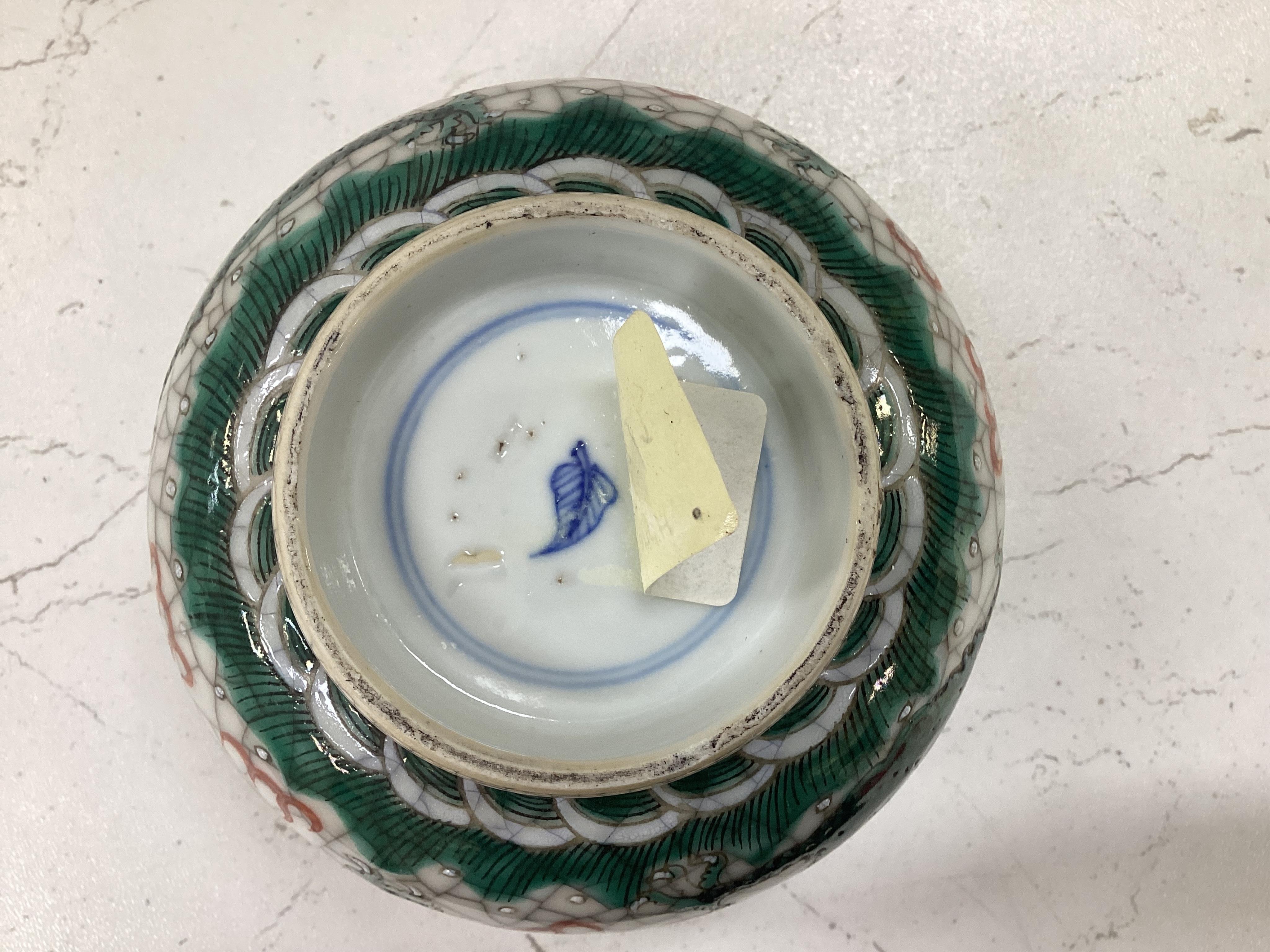 A Chinese crackleglaze famille verte ‘dragon’ bowl and a millefleur cup and saucer, bowl 11cm diameter. Condition - fair